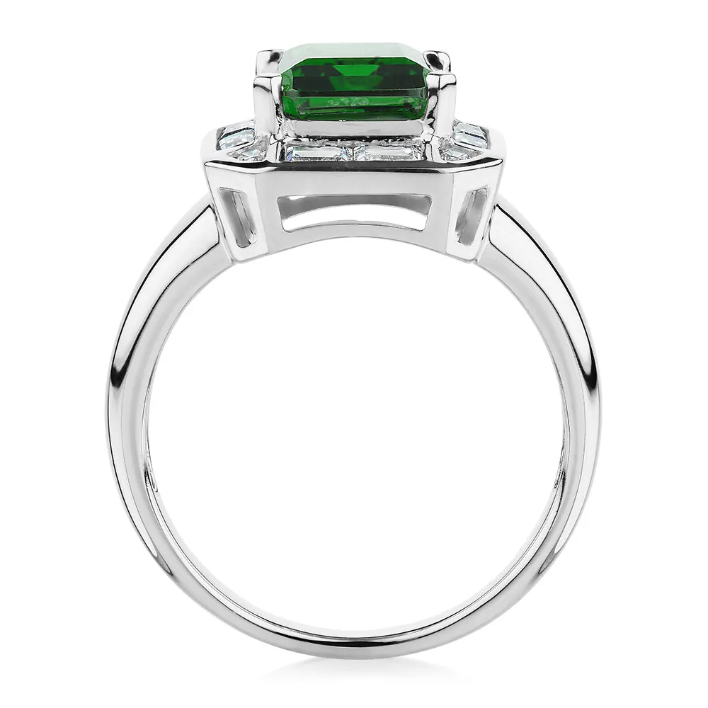 Dress ring with 10x8mm emerald simulant and 1.02 carats* of diamond simulants in 10 carat white gold