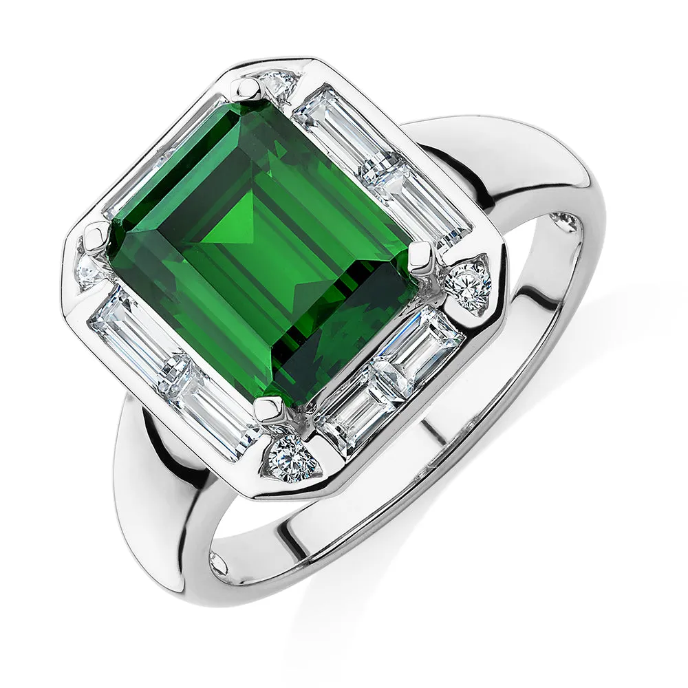 Dress ring with 10x8mm emerald simulant and 1.02 carats* of diamond simulants in 10 carat white gold
