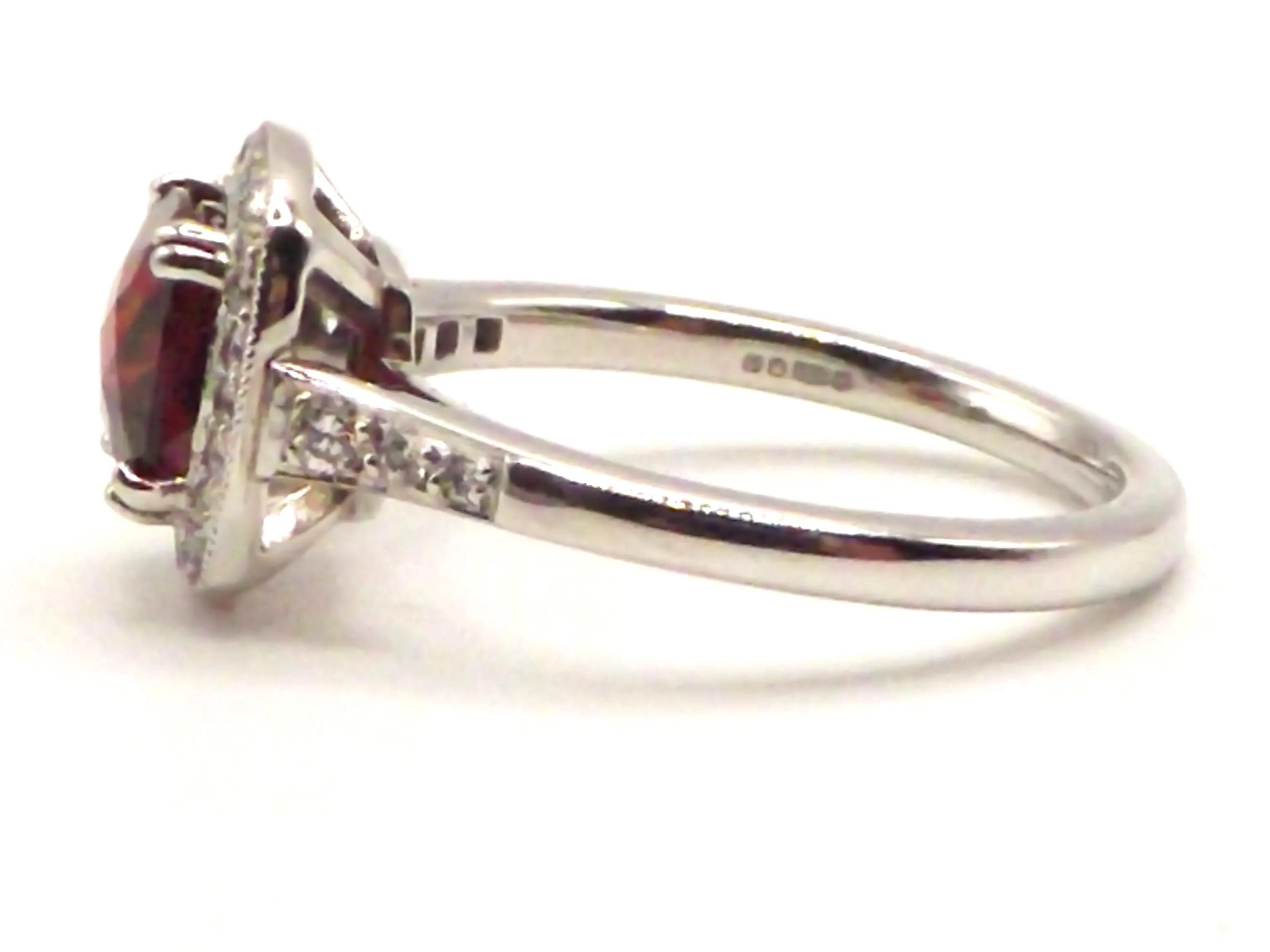 Platinum ring with a 1.68 ct Garnet and 0.22 ct Diamonds